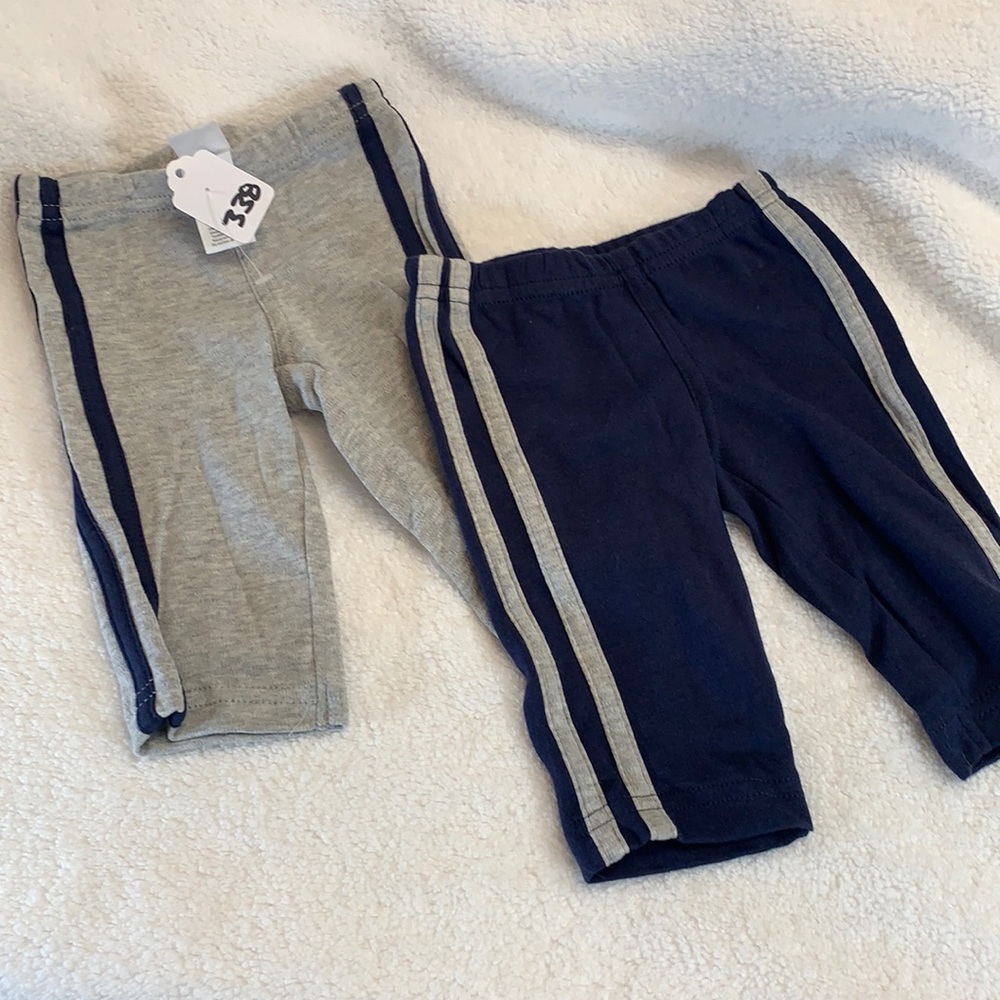 NWOT CARTER’S SET OF TWO PAIRS OF PANTS SIZE NB
